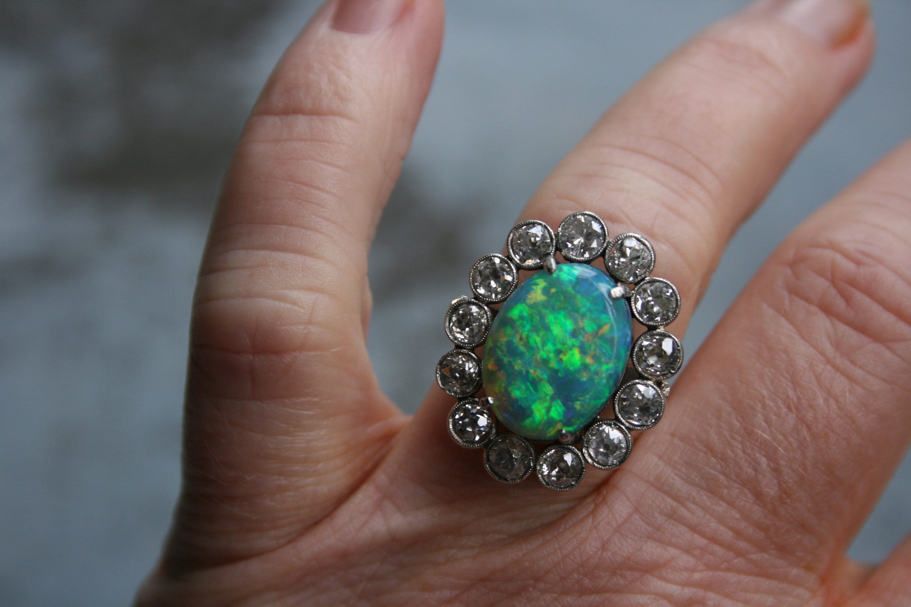 Gorgeous Vintage Opal and Diamond Halo Platinum Ring Engagement Ring.