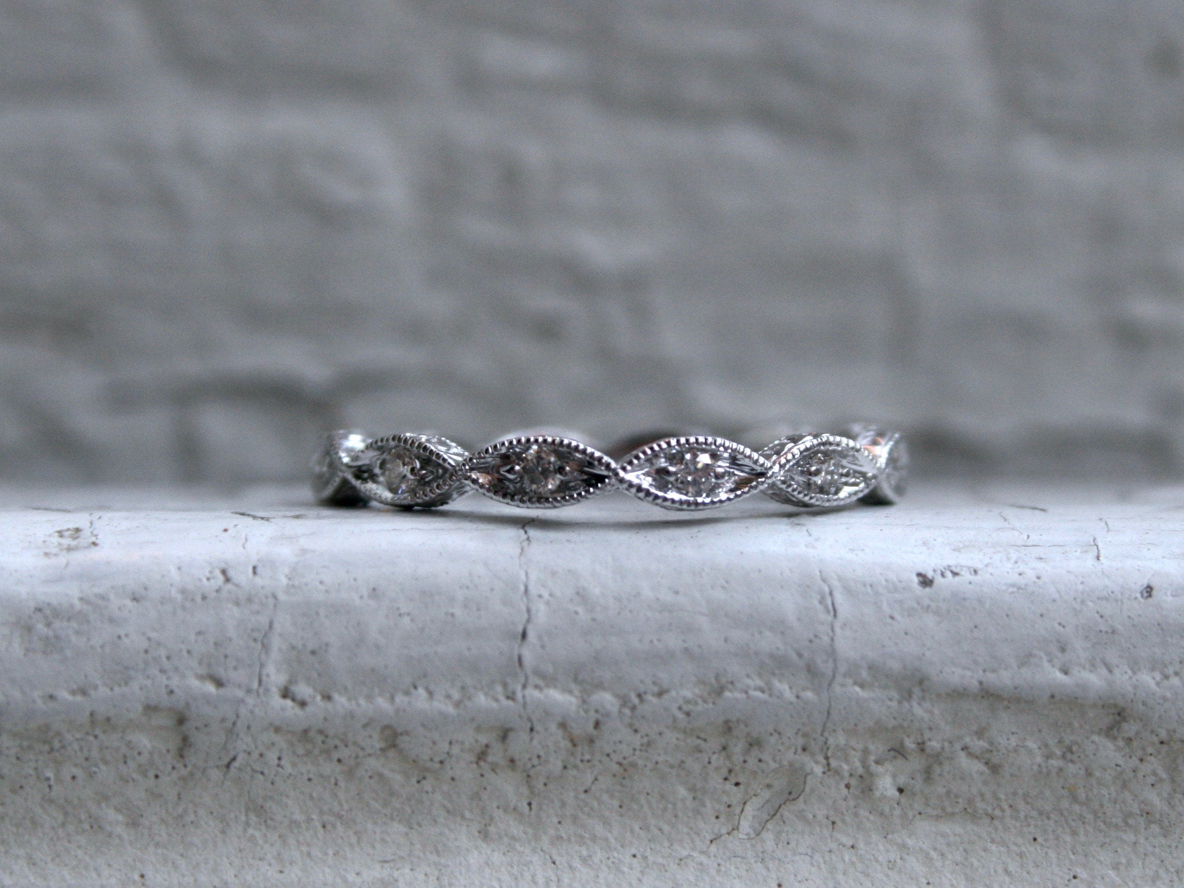 Twisted 14K White Gold Diamond Wedding Band with Engraved Sides.