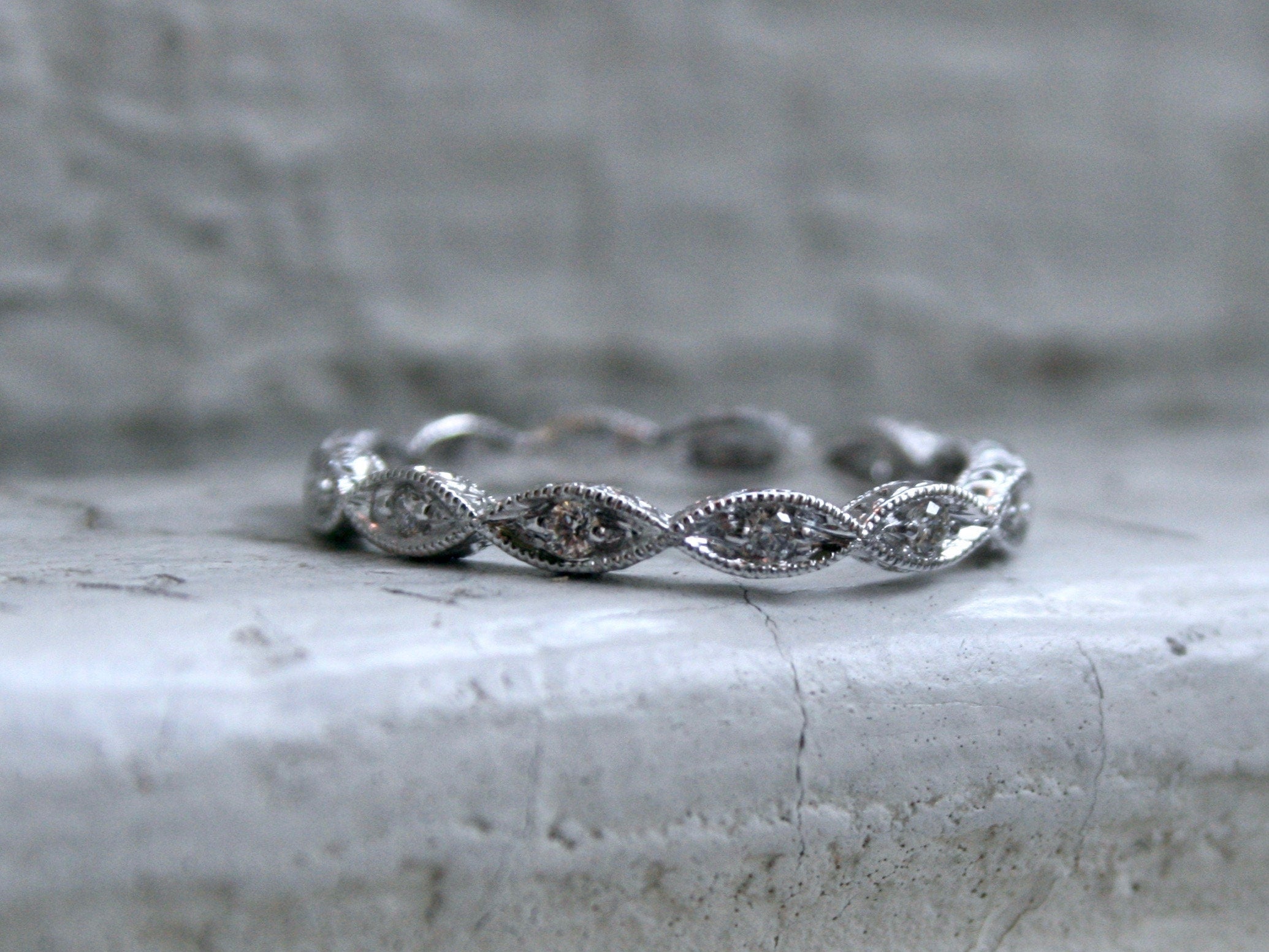 Twisted 14K White Gold Diamond Wedding Band with Engraved Sides.