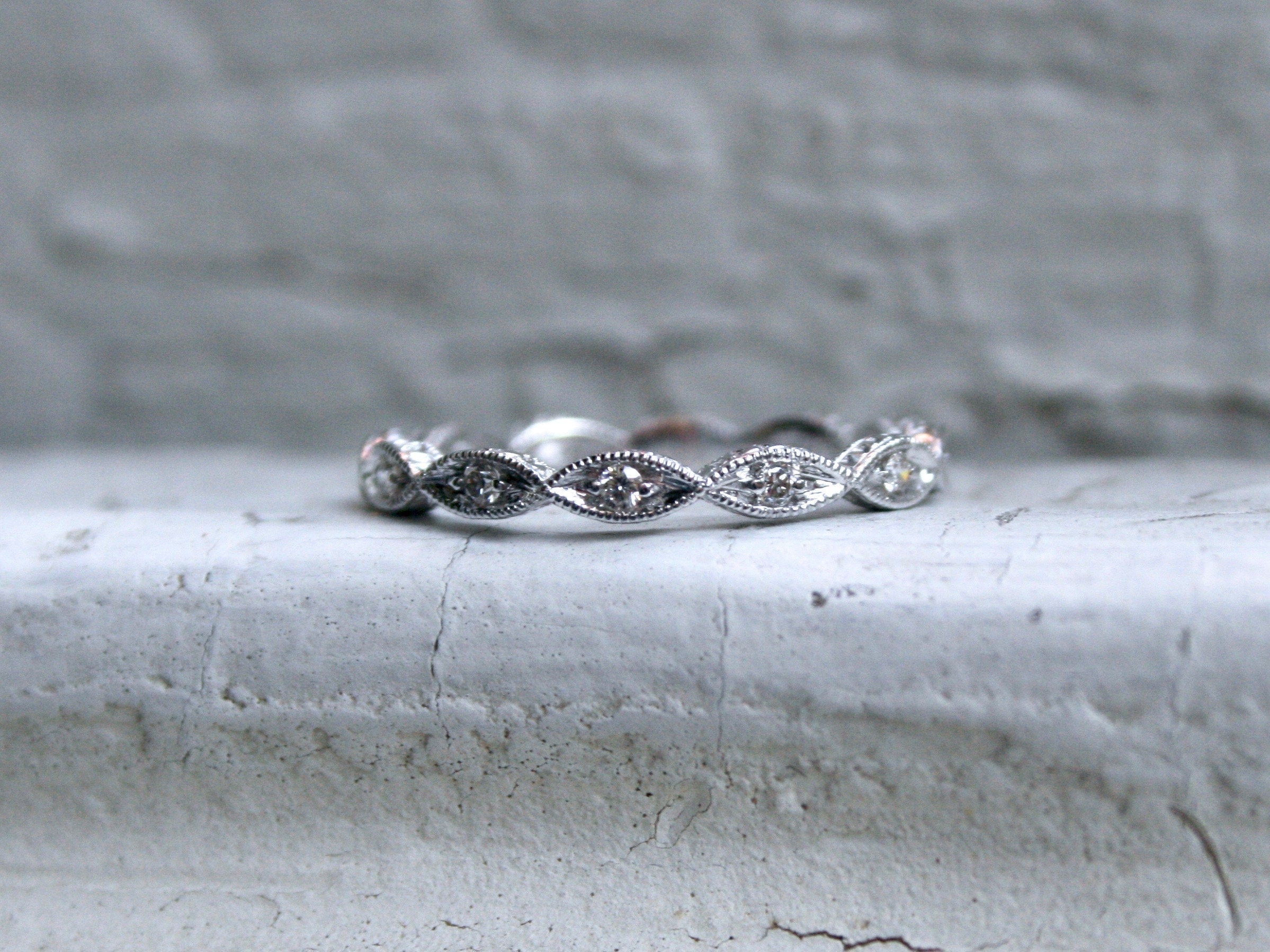 Twisted 14K White Gold Diamond Wedding Band with Engraved Sides.