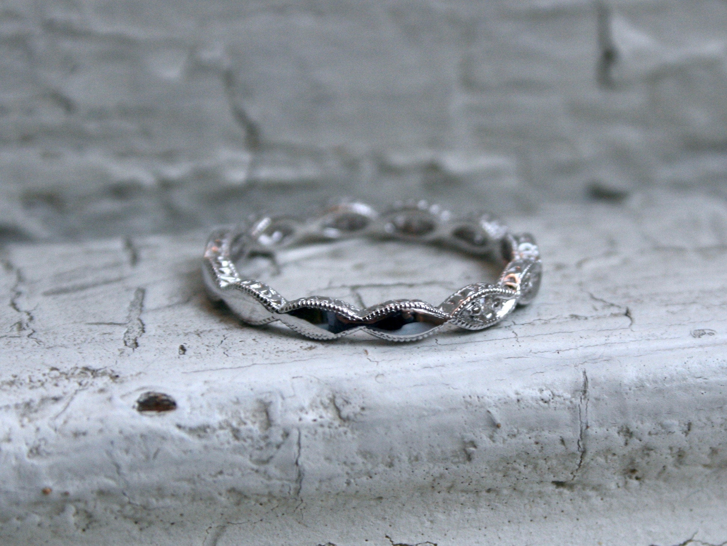 Twisted 14K White Gold Diamond Wedding Band with Engraved Sides.