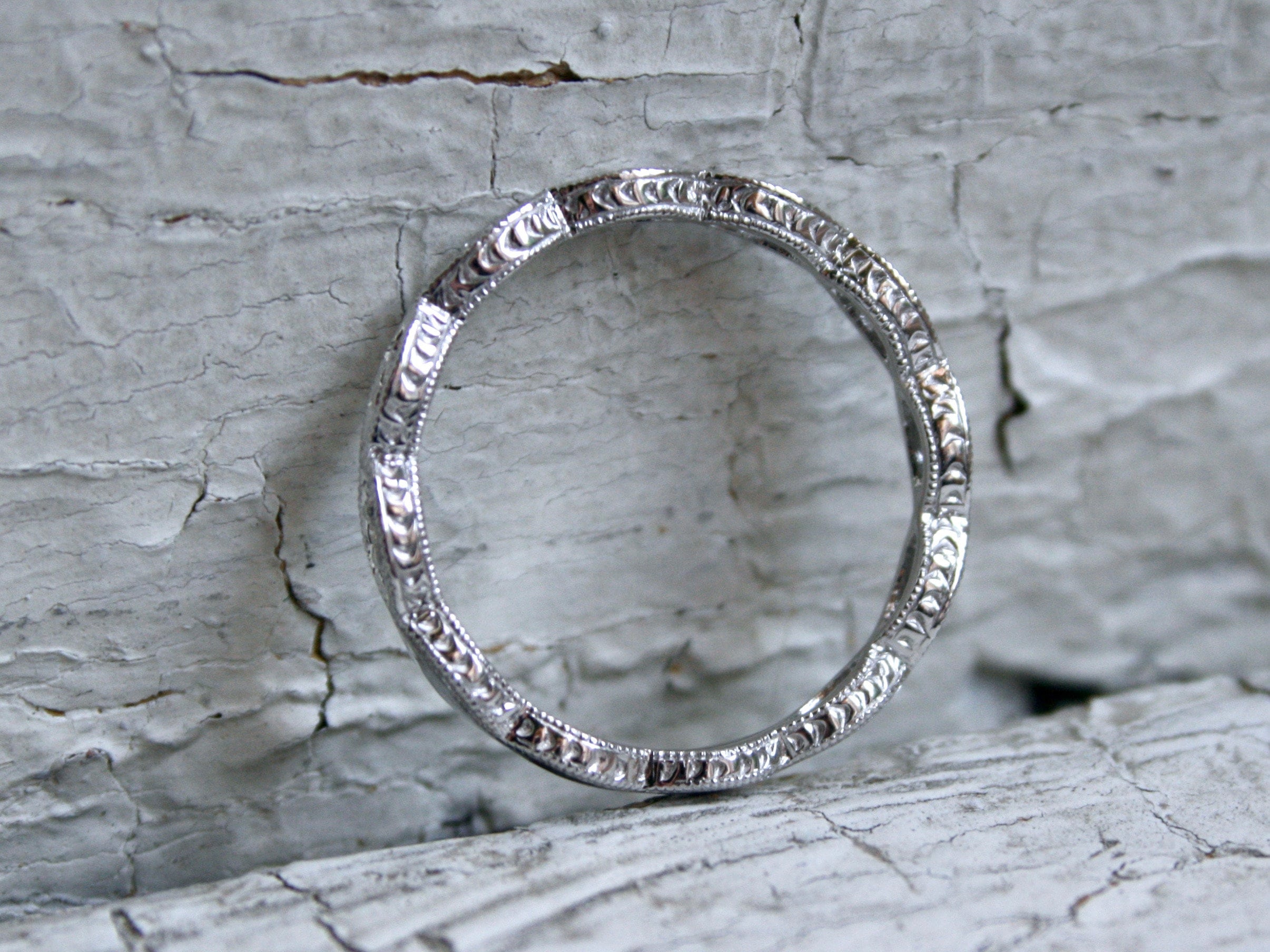 Twisted 14K White Gold Diamond Wedding Band with Engraved Sides.