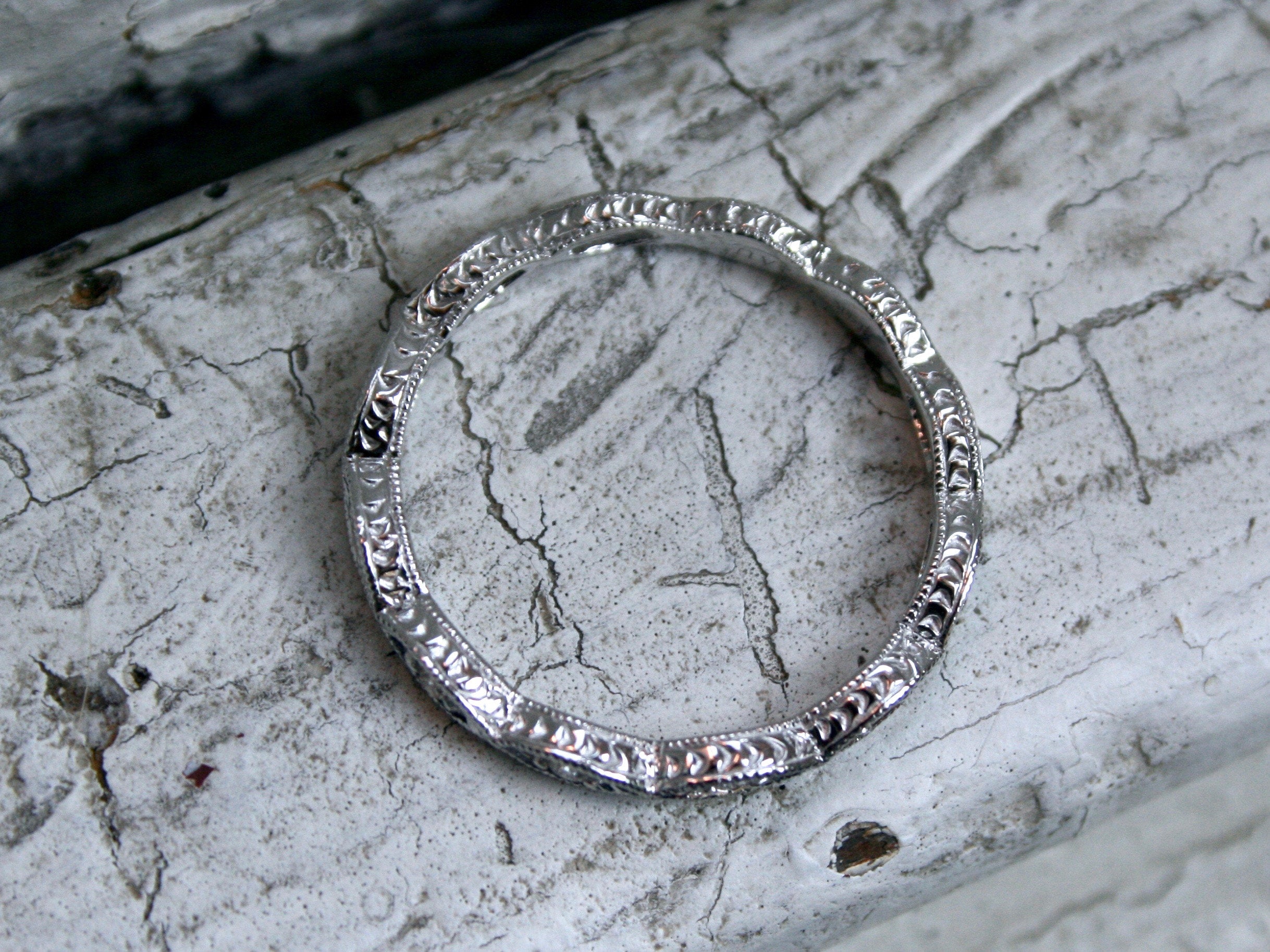 Twisted 14K White Gold Diamond Wedding Band with Engraved Sides.