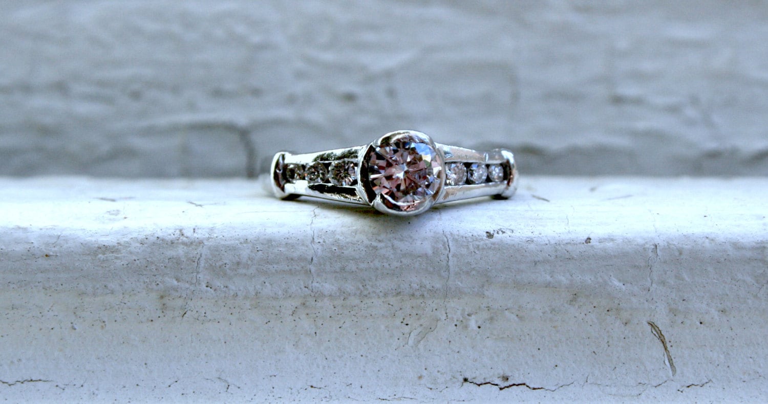 Vintage Platinum Channel Diamond Engagement Ring - 0.68ct.